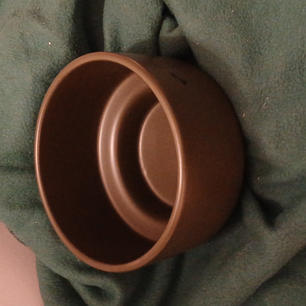 Dark green decorative bowl or can be